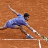 Carlos Alcaraz abordera la finale de dimanche avec les faveurs du pronostic. KEYSTONE/EPA/SEBASTIEN NOGIER